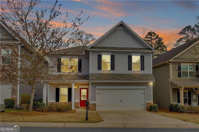 craftsman inspired home featuring a garage