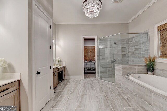 bathroom featuring vanity, a notable chandelier, separate shower and tub, and crown molding