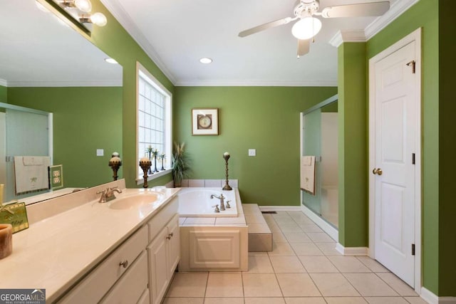 bathroom with vanity, ornamental molding, tile patterned floors, and separate shower and tub