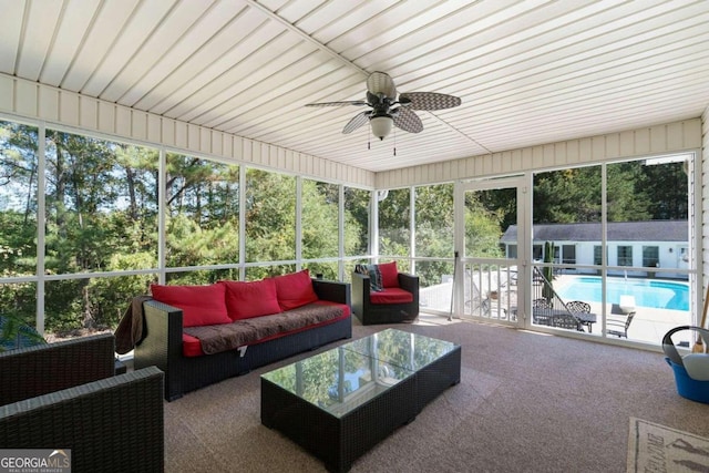 sunroom / solarium with ceiling fan