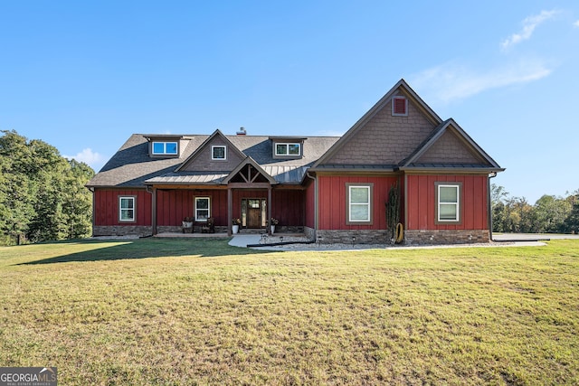 craftsman house featuring a front yard