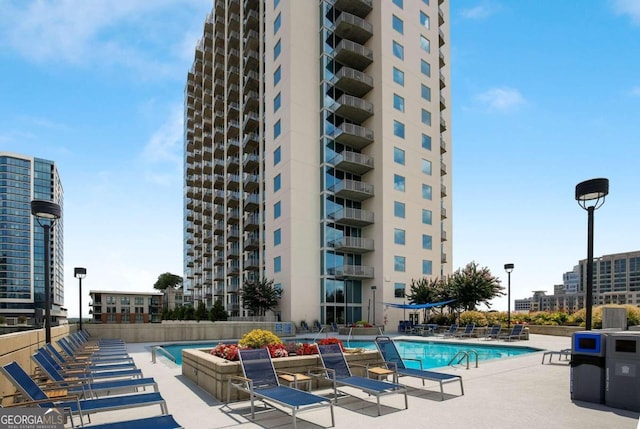 view of pool featuring a patio area