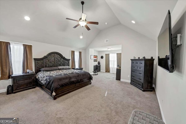 carpeted bedroom with multiple windows, high vaulted ceiling, and ceiling fan