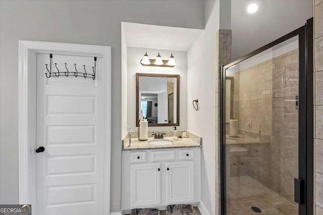 bathroom with vanity and walk in shower