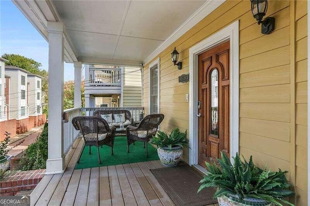 wooden deck with covered porch