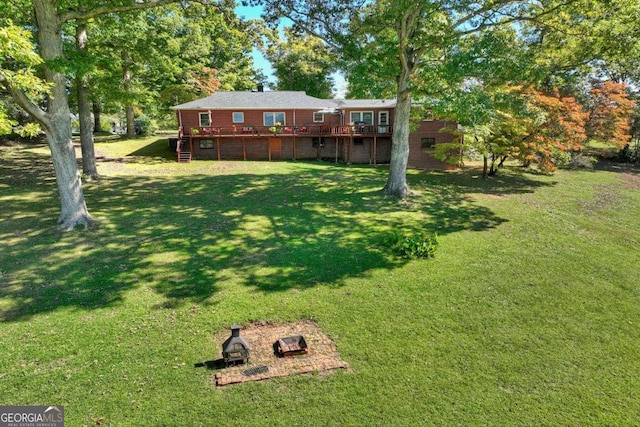 view of yard featuring a deck