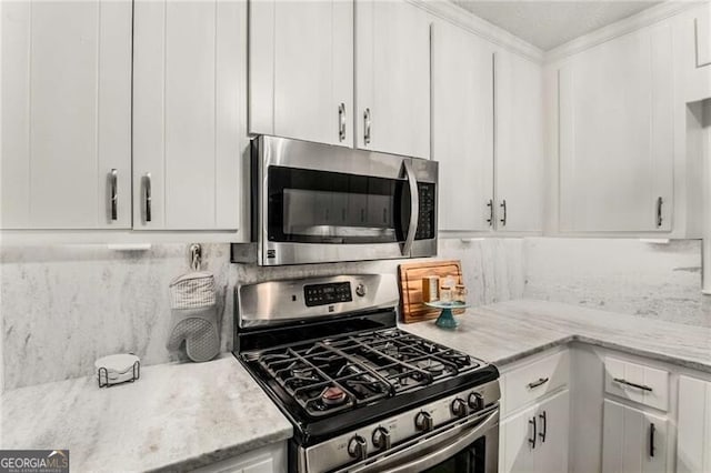 kitchen with white cabinets and stainless steel appliances