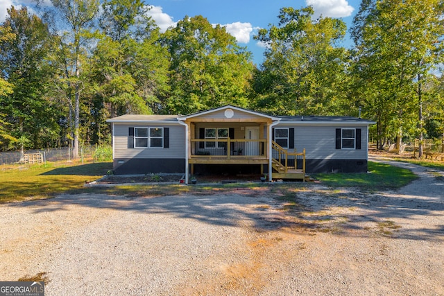 manufactured / mobile home featuring a deck