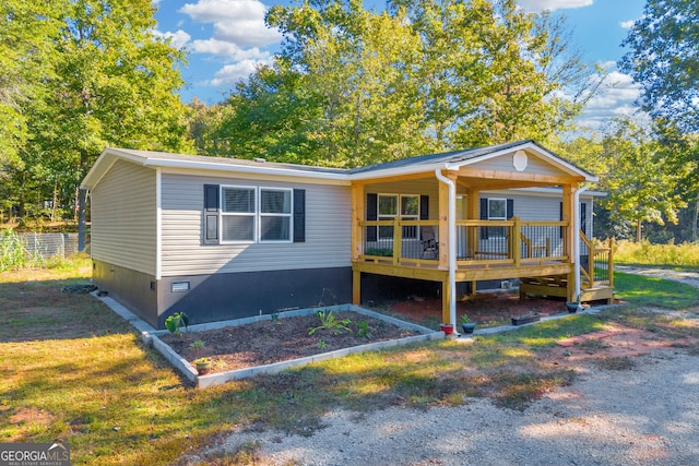 view of front of home with a deck