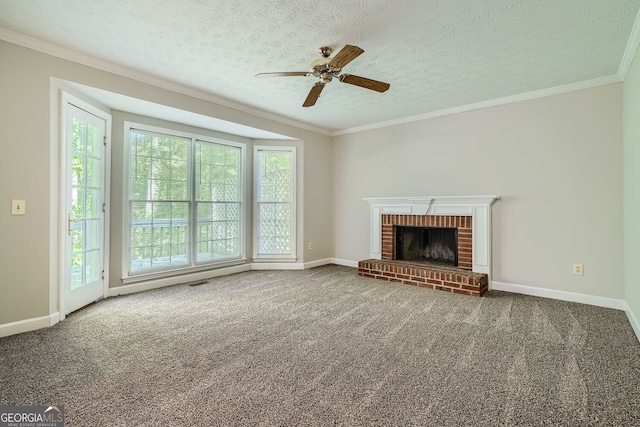 unfurnished living room featuring carpet flooring, a textured ceiling, and a fireplace