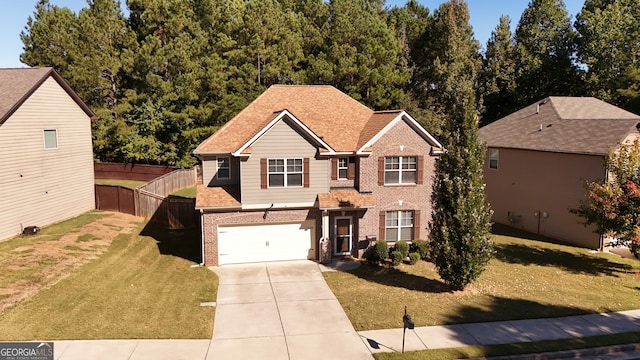 front of property with a garage and a front yard