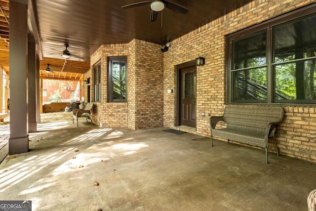 view of patio / terrace featuring ceiling fan