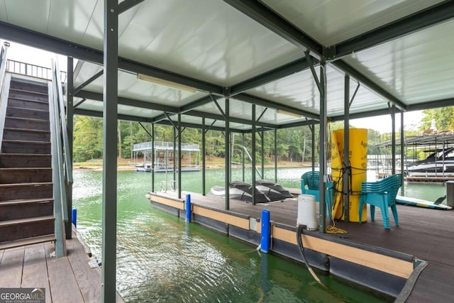 dock area featuring a water view