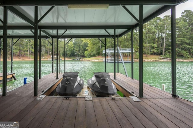 dock area featuring a water view