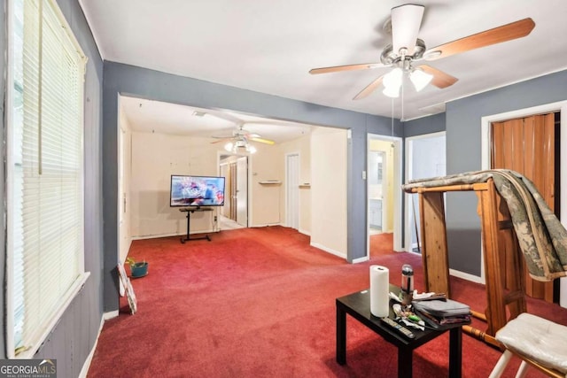 workout area with carpet floors and ceiling fan