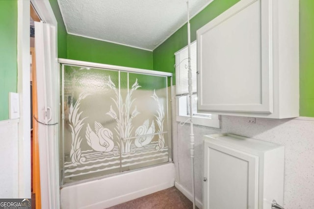 washroom with a textured ceiling