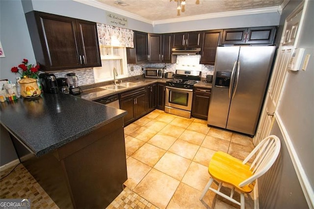 kitchen featuring sink, backsplash, stainless steel appliances, dark brown cabinetry, and crown molding