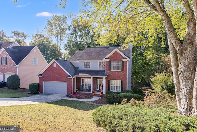 front facade with a front yard and a porch