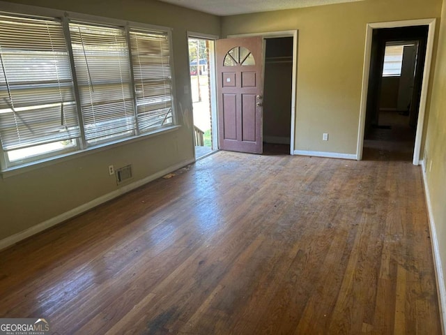 foyer entrance featuring hardwood / wood-style floors