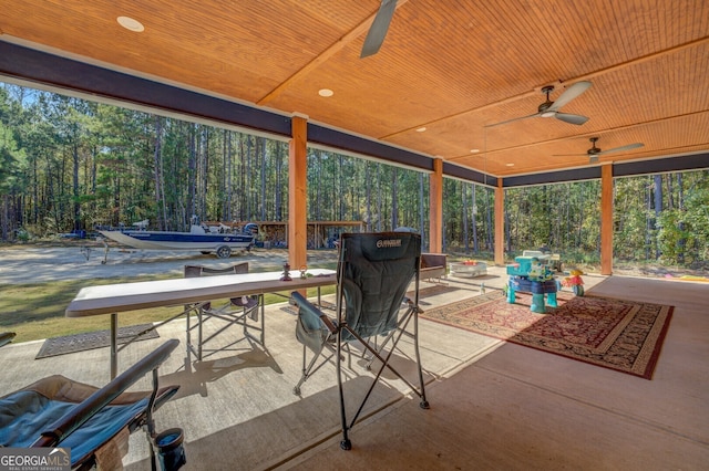 view of patio featuring ceiling fan