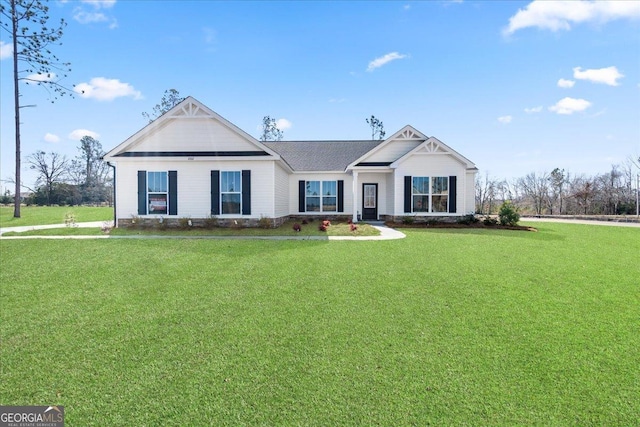 view of front facade with a front yard