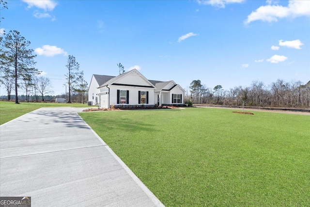 view of front of home with a front yard