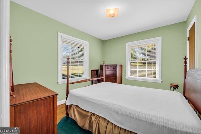 bedroom featuring hardwood / wood-style flooring