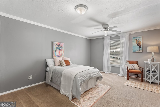 bedroom with a textured ceiling, crown molding, carpet floors, and ceiling fan