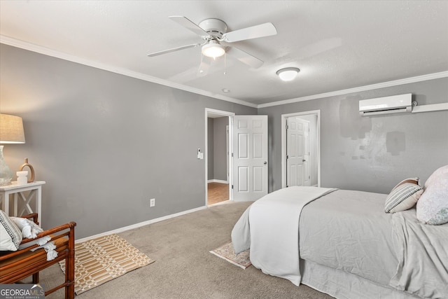 carpeted bedroom with a wall unit AC, ornamental molding, and ceiling fan