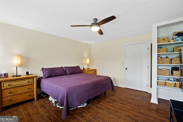 bedroom featuring dark hardwood / wood-style floors and ceiling fan