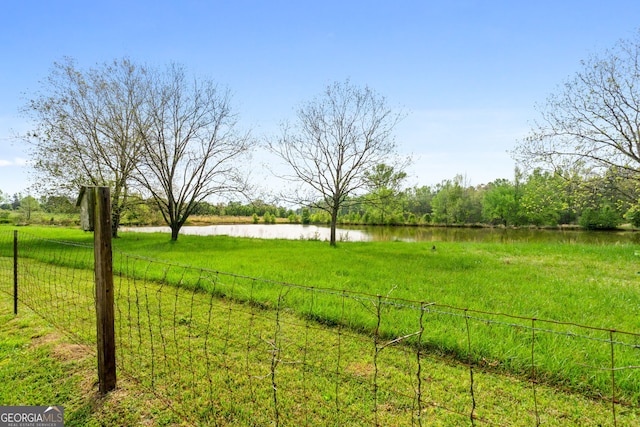 view of yard with a water view