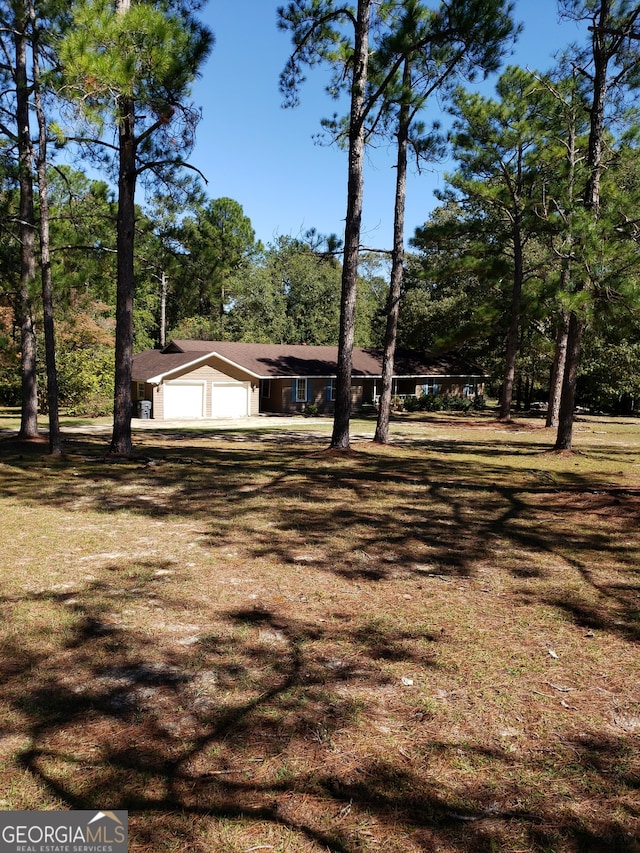 view of front of property with a garage