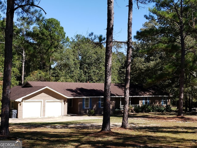 single story home with a garage