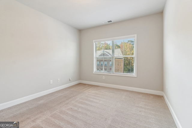 view of carpeted spare room