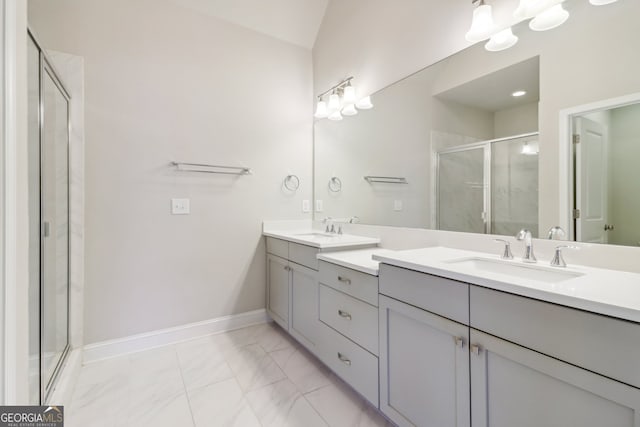 bathroom with vanity, lofted ceiling, and an enclosed shower