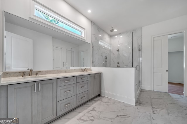 bathroom with vanity and walk in shower