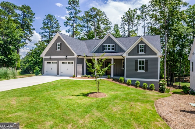 craftsman-style house with a porch, a front yard, and a garage