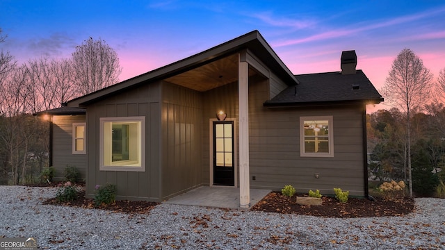 ranch-style home with a patio