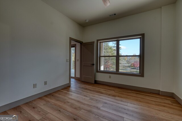 empty room featuring light hardwood / wood-style floors