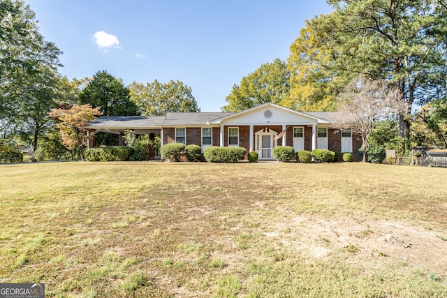 ranch-style home with a front yard