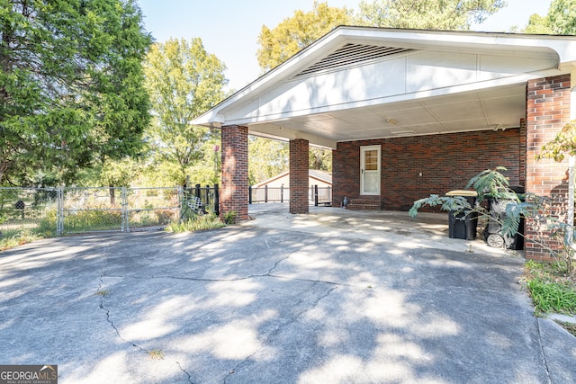 view of patio / terrace featuring a carport