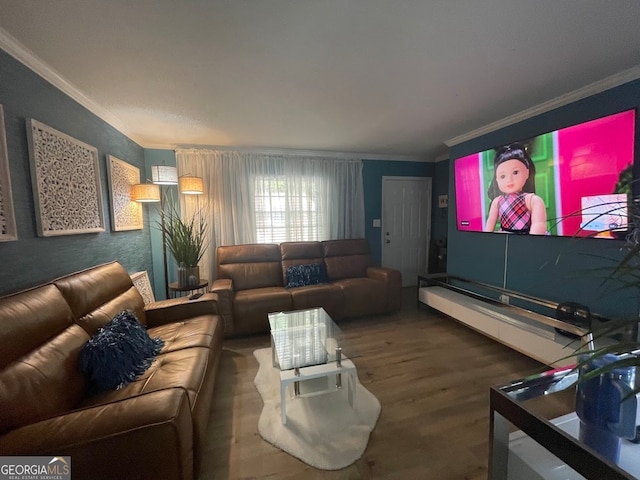 living room featuring ornamental molding and hardwood / wood-style floors