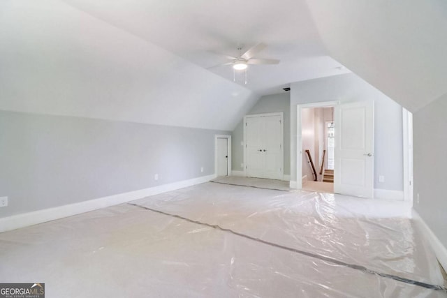 bonus room featuring vaulted ceiling and ceiling fan