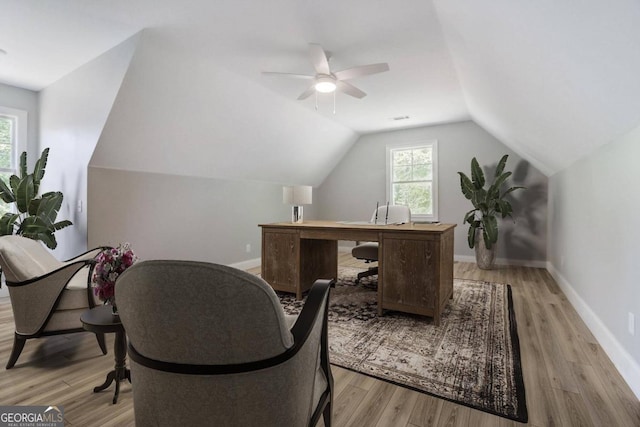 office area with lofted ceiling and light hardwood / wood-style flooring