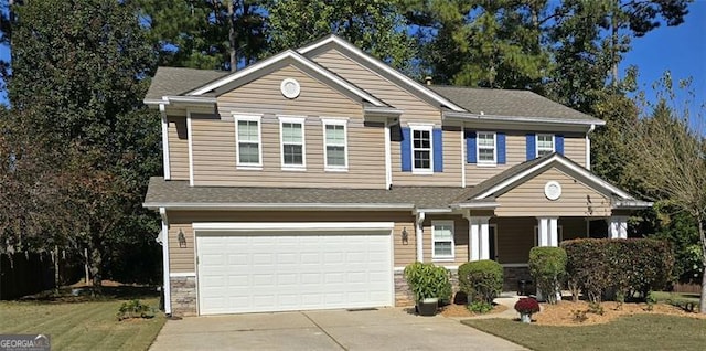 view of front of home with a garage