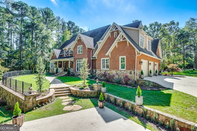 222 Valley View Dr, Rockmart, GA 30153 - craftsman-style house featuring fence, a front lawn, driveway, and stone siding