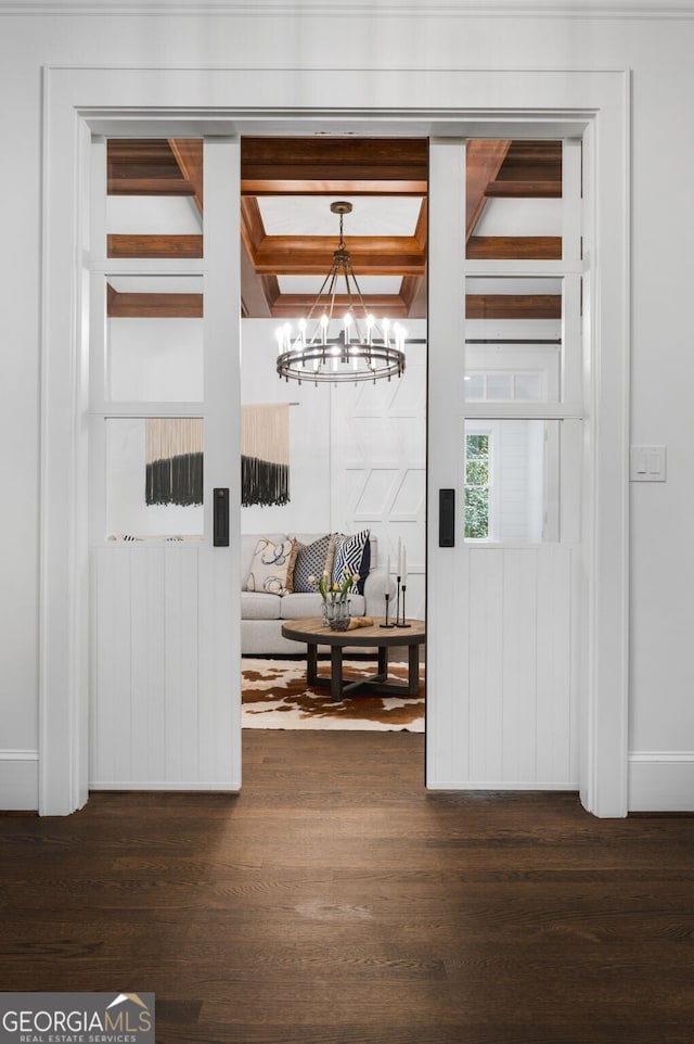 222 Valley View Dr, Rockmart, GA 30153 - interior space with a chandelier, baseboards, and dark wood-style flooring