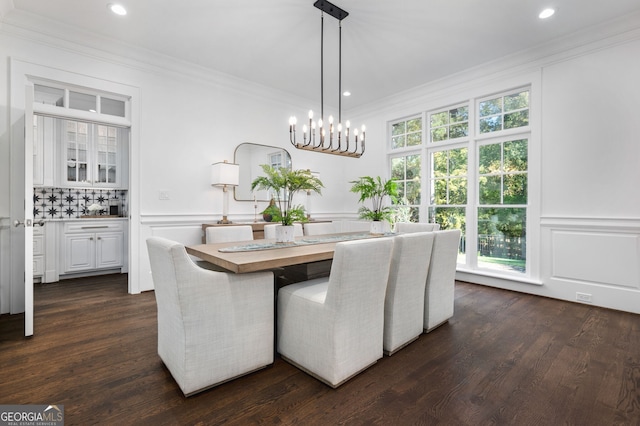 222 Valley View Dr, Rockmart, GA 30153 - dining room featuring a chandelier, crown molding, a decorative wall, wainscoting, and dark wood finished floors
