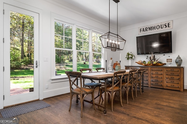 222 Valley View Dr, Rockmart, GA 30153 - dining space featuring ornamental molding, a chandelier, wood finished floors, and baseboards