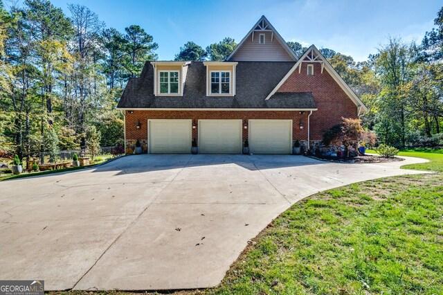 222 Valley View Dr, Rockmart, GA 30153 - view of front of house featuring brick siding, fence, driveway, roof with shingles, and an attached garage